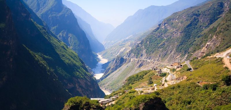 Tiger Leaping Gorge, China — the Jinsha River far below steep green mountainsides